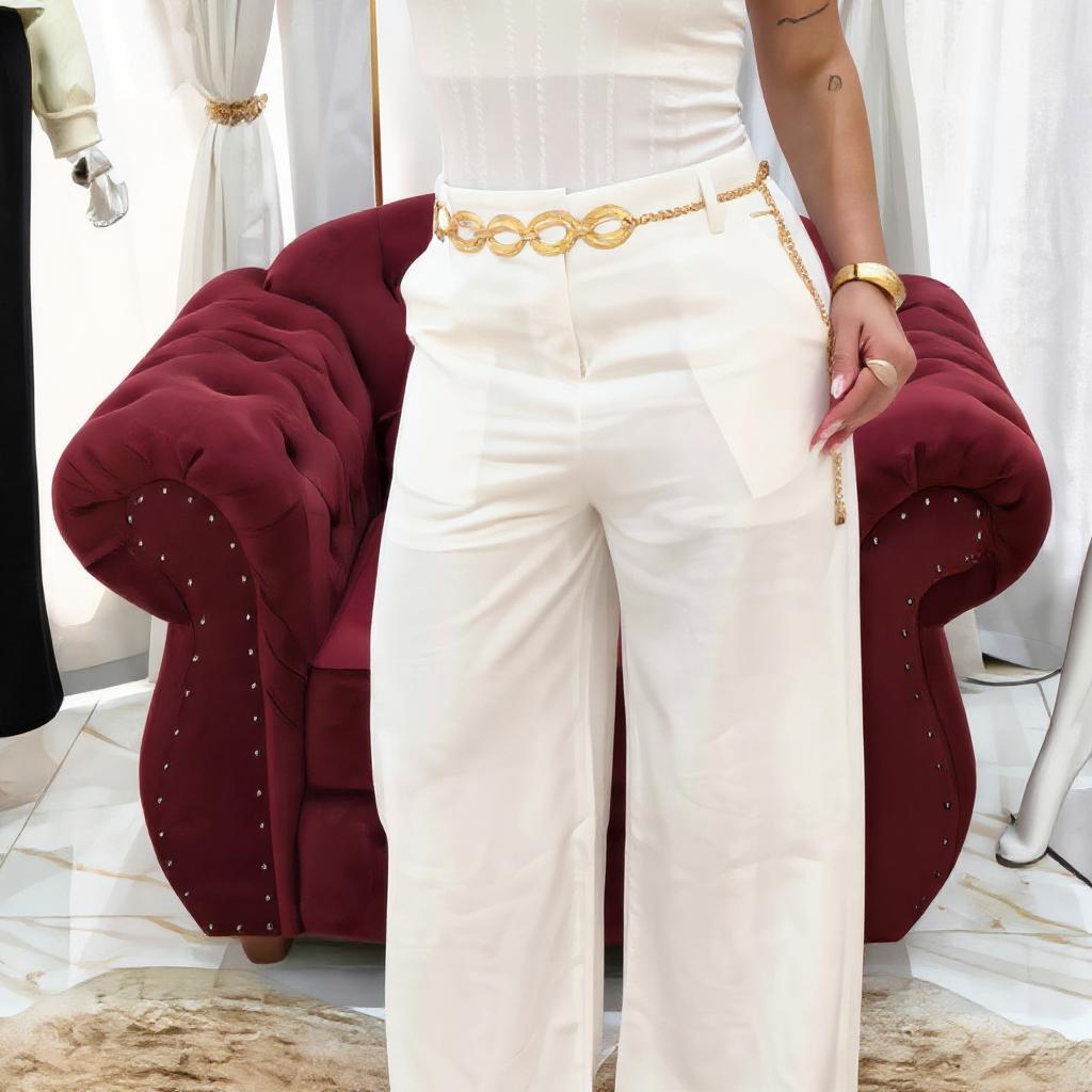 Calça feminina moderna em modelagem reta, combinada com blusa leve em look versátil e elegante